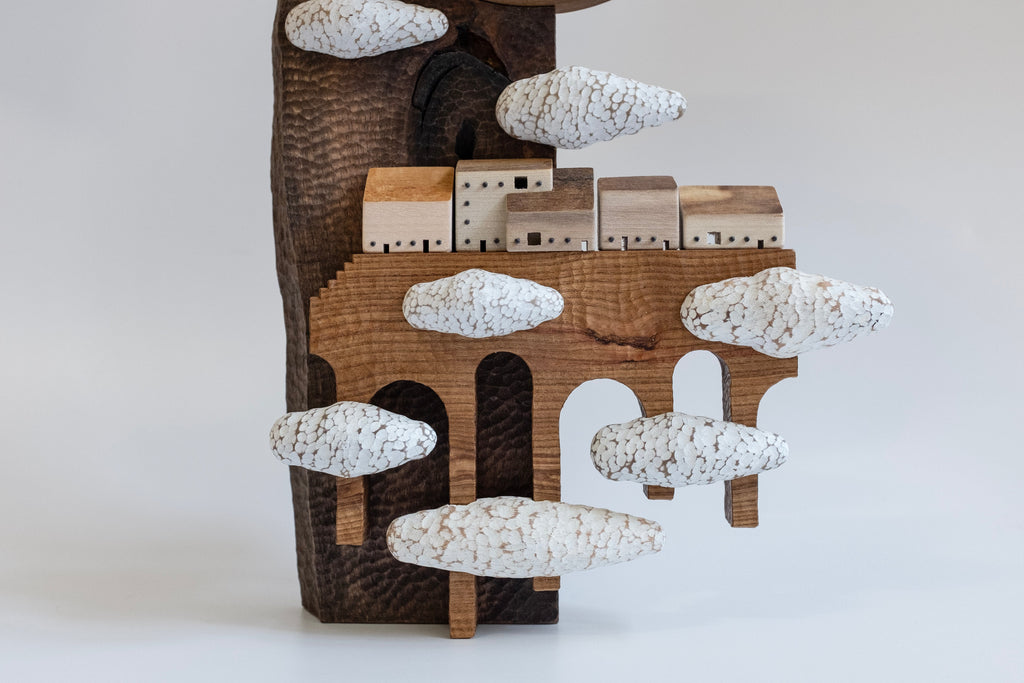 Demeure dans les nuages Sculpture architecturale en bois superposée