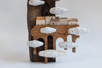 Demeure dans les nuages Sculpture architecturale en bois superposée