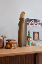 Hibou en bois sur branche (figurine)