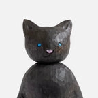 Figurine de chat noir dodu en bois